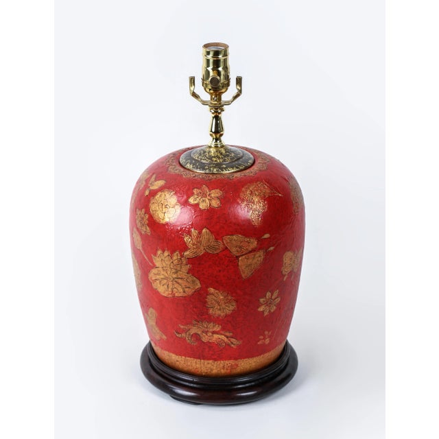 Red Hand Painted Flower Table Lamp. Hand-painted golden lotus flowers on a red background has a very good decorative effect.