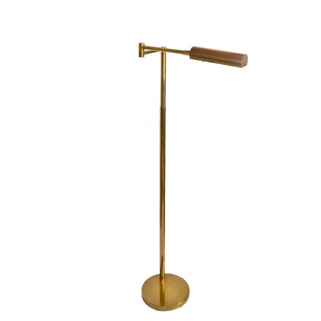 Koch and Lowy 10 inches Height adjustable swing brass pharmacy floor lamp with a cylindrical hood and articulated arm....