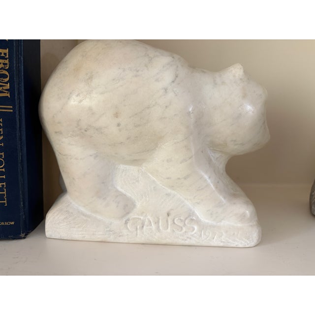 A charming pair of hand-carved marble animal sculptures by American sculptor Eugene Gauss (1905–1988), consisting of a...