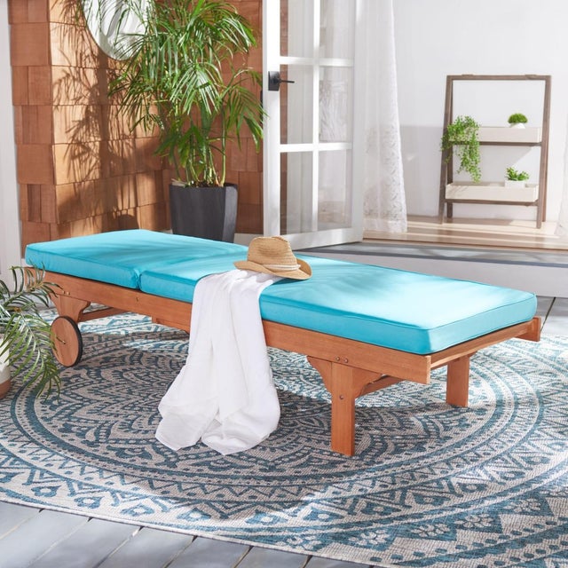 A fresh update of an English garden classic, the Newport Outdoor Lounge Chair recalls the manicured landscapes of Rhode...