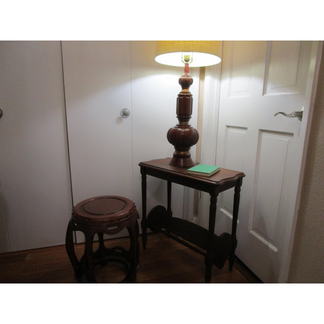 This is the most charming table, from the lower shelf for books, to the veneered wood and the serpentine details. This is...