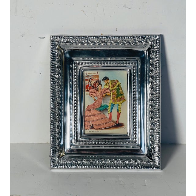 Spanish antique silk embroidered postcard of Flamenco dancer and toreador bullfighter, framed in ornate heavy metal frame.