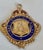 A distinctive British sterling silver-gilt presentation medallion dating to 1933, hallmarked in Chester and associated...