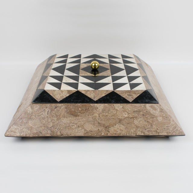 Maitland-Smith designed this spectacular lidded box. The piece was crafted circa 1980. The box features a tessellated...