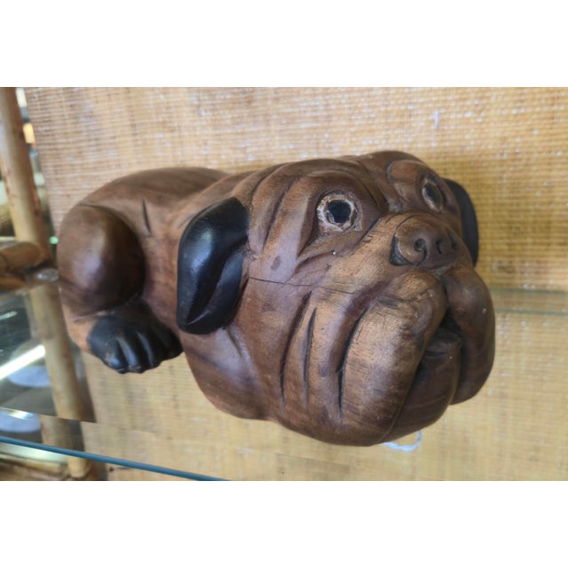 This fantastic wooden version of mans best friend is hand carved and sure to make you smile. There is a signature on the...