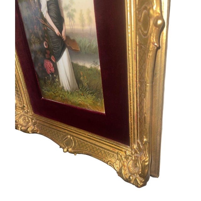 A refined and elegant pair of 19th century Italian porcelain plaques, beautifully presented in ornate gilt frames with...