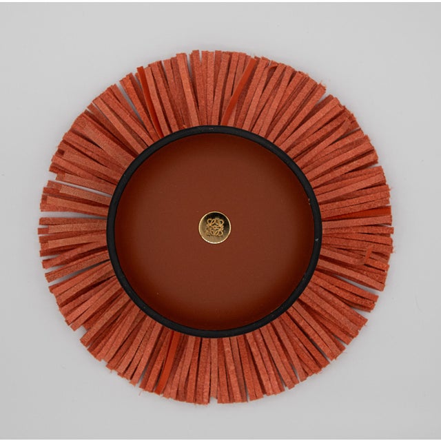 Loewe Tassel Box - Yellow - 4" A round ceramic box with a lid in calfskin and fringed leather. Lined in calfskin embossed...