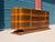A striking French Art Deco sideboard dating to the 1930s, originally imported from France by its previous owner. This...