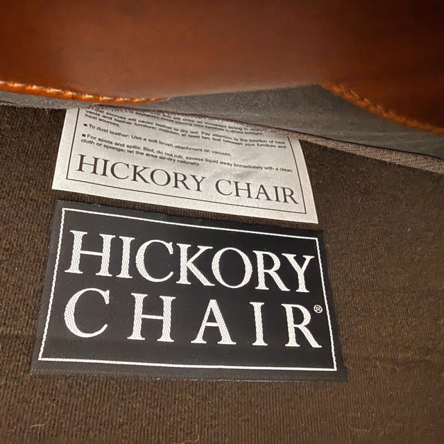 Hickory Chair Farm Wing Settee A handsome settee in a buttery caramel brown leather with subtle nailhead detail around the...