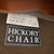 Hickory Chair Farm Wing Settee A handsome settee in a buttery caramel brown leather with subtle nailhead detail around the...
