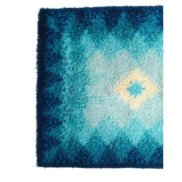 Amazing mid-century blue and white pure virgin wool rug. This wonderful rug was produced by Samit Borgosesia in Italy...