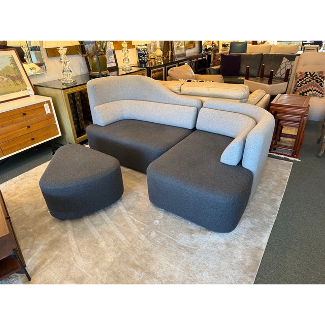 Design Plus Gallery presents the Ottawa Sofa + Ottoman by Karim Rashid for BoConcept. Sculptural curves and fluid geometry...