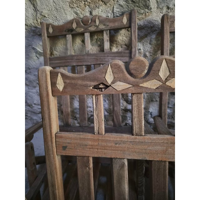 Set of six vintage folding lounge chairs originating from the USA and dating from approximately 1940–1960. The chairs are...