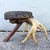 This early 20th century American rustic footstool captures the spirit of the great outdoors with remarkable handcrafted...