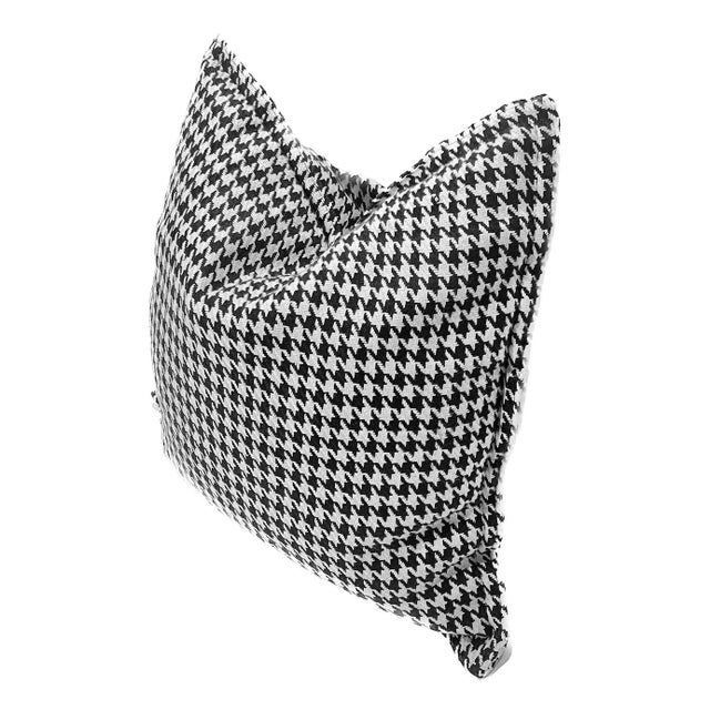 Vintage houndstooth pattern pillow with black large button closure on the reverse side. Down Fill. No maker's marks.