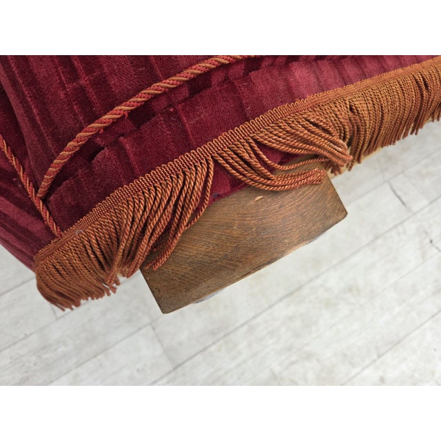 1960s, Danish 2-seater "Banan" sofa. Original striped red furniture velour, oak wood legs, brass springs in the seat....