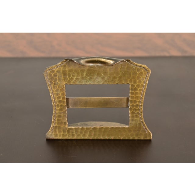 A gorgeous Arts & Crafts period brass finished hand hammered copper desk calendar frame or picture frame By Roycroft...