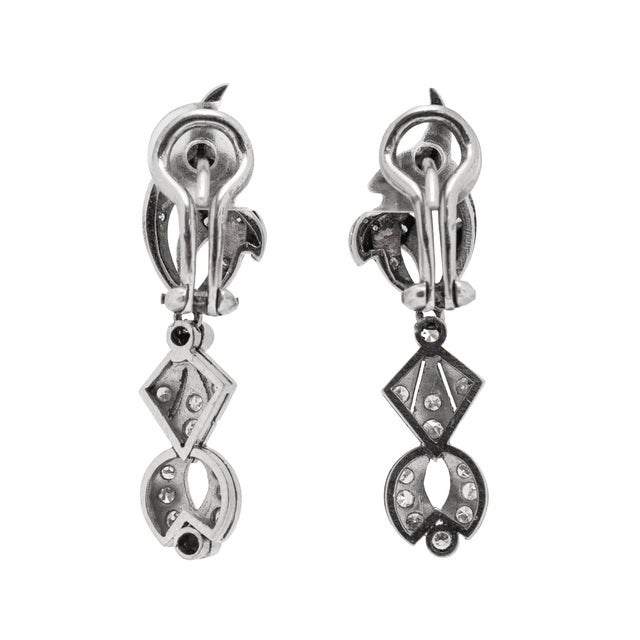Gender: Ladies Metal Type: White Gold & Silver & Palladium Length: 1.50 inches Width: 3.20 mm Weight: 6.30 grams One pair...