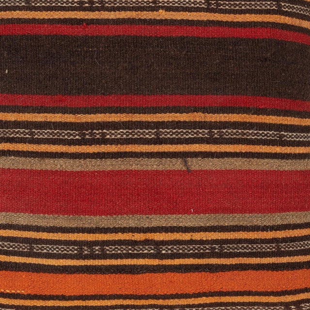 Add a touch of history and warmth to your space with this vintage handmade Turkish wool kilim cushion cover. Crafted from...