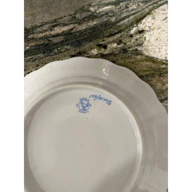 The backstamp on the underside of this plate identifies it as antique German porcelain produced by the Erdmann...