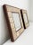 A wonderful pair of small accent wall mirrors handmade by Joel Krakauer. The mirrors are framed in rosewood and secured...