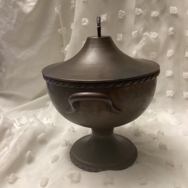 Is a very unique brass/metalwork soup tureen serving bowl. This would be a definite touch of charm and luxury to any home....