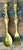 This captivating vintage brass serving set is a masterful example of global artisanal design, featuring a figural fork and...