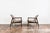 A pair of gfm-64 armchairs designed by edmund homa, produced by the gościcińska fabryka mebli (gfm) in poland during the...