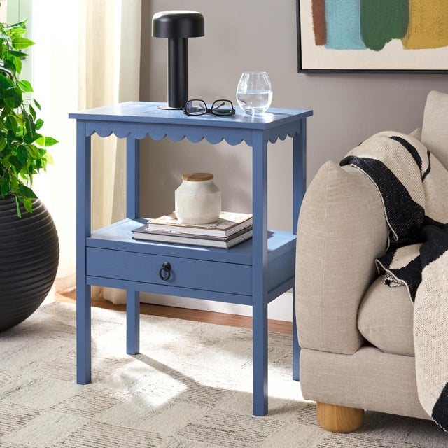 Bring understated elegance to your home with the Haven Low Drawer Accent Table in a warm blue finish. This beautifully...