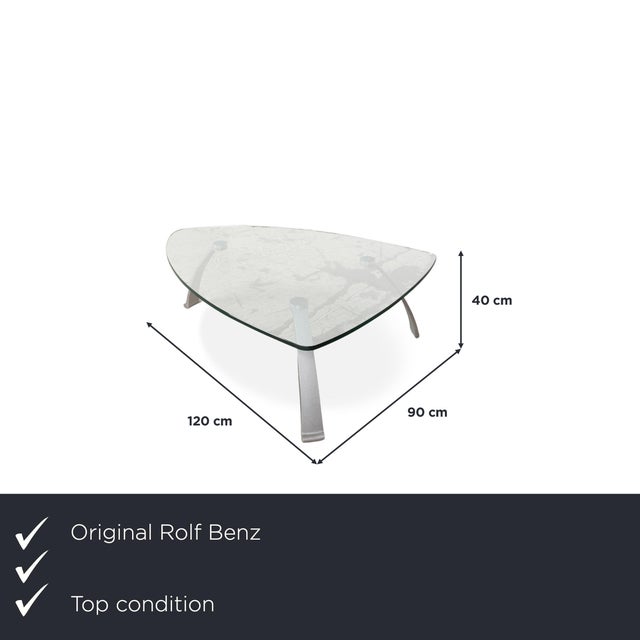 The Rolf Benz 5021 table impresses with its distinctive triangular shape and gently rounded corners, designed by Anita...