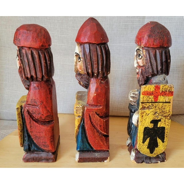 Offered are three 8.5" H. Spanish hand-carved, polychromed wooden statues, also called santos, which are religious folk-...
