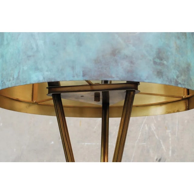 Croisette brass floor lamp, signed by Stefan Leo. Brass patinated (dark brown or green). Measure: 48 x 48 cm, H 170 cm....