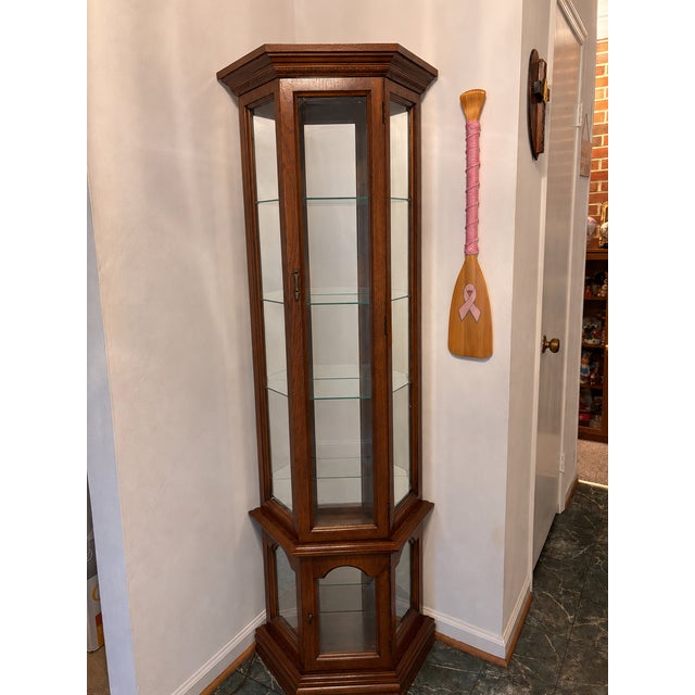 I have 3 curio cabinets, all similar in size and design. All three are pictured. Selling separately or together. Beautiful...