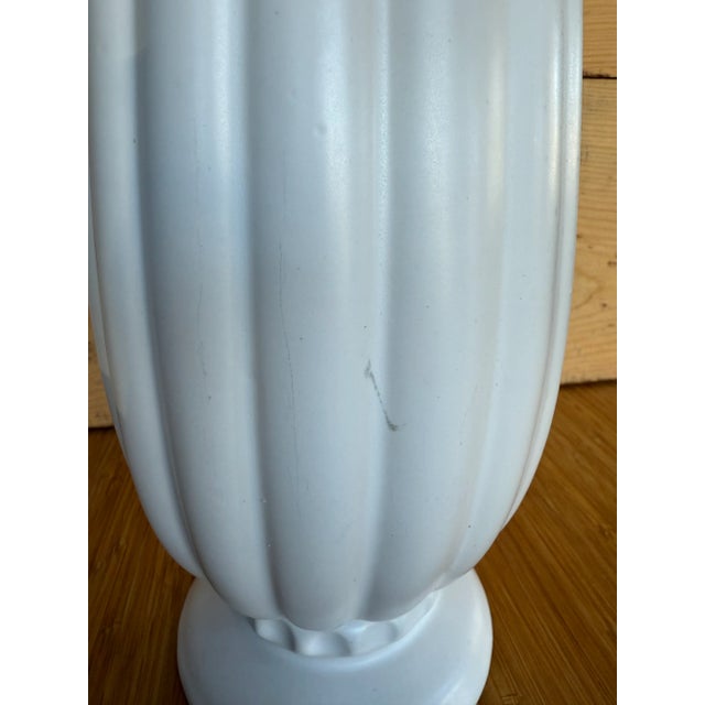 Beautiful McCoy white matt MCM pottery vase. We love McCoy and this one is great! This will go with any interior style and...