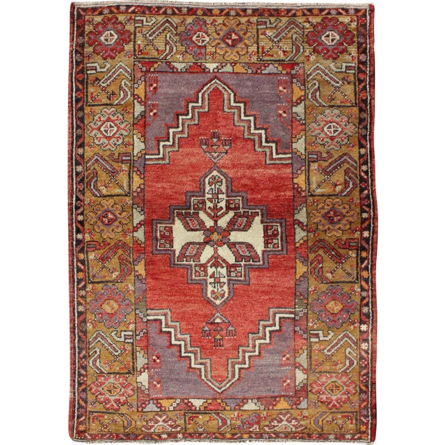 Geometric Vintage Turkish Oushak Carpet in Soft Red, Light Purple, & Gold Border For Sale