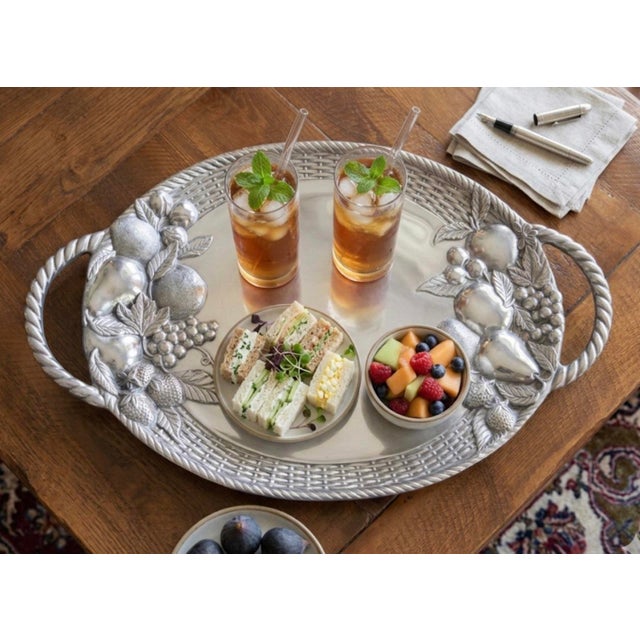 Elevate your serving ritual with this oversized 23.25 handled tray from Gorham’s discontinued “Country Terrace” hollowware...