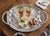 Elevate your serving ritual with this oversized 23.25 handled tray from Gorham’s discontinued “Country Terrace” hollowware...