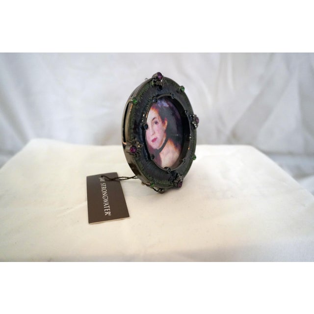Small Enamel & Crystal Jay Strongwater Round Frame Peacock colored enamel (blue, purple, green), with coordinating purple,...
