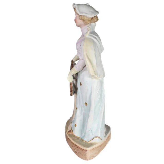 A beautiful figure from the masters in figurine creation, Gebruder Heubach. This is an absolutely stunning figurine of a...