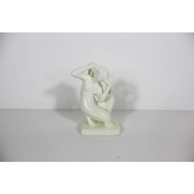 Vintage white glazed ceramic figurine of Crouching Aphrodite or Venus of Rhodes. Marked Icaros Rhodes Greece 3” wide 2.25”...