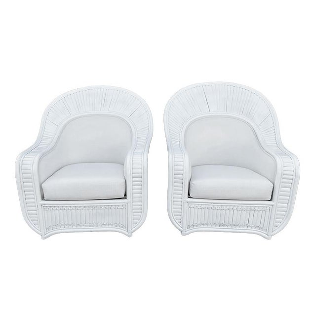 Fabulous pair of Ficks Reed style Split Rattan Fan Back Chairs with ottoman. Freshly lacquered in white and Upholstered in...