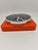 Vintage Meister Anker Wall Clock, Plastic, Orange Quartz Clock, 1990s Square plastic clock 20 x 17 x 6 cm This piece has...