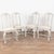 There is an understated elegance to this set of ten antique Swedish pine dining chairs in the graceful Rococo style. The...
