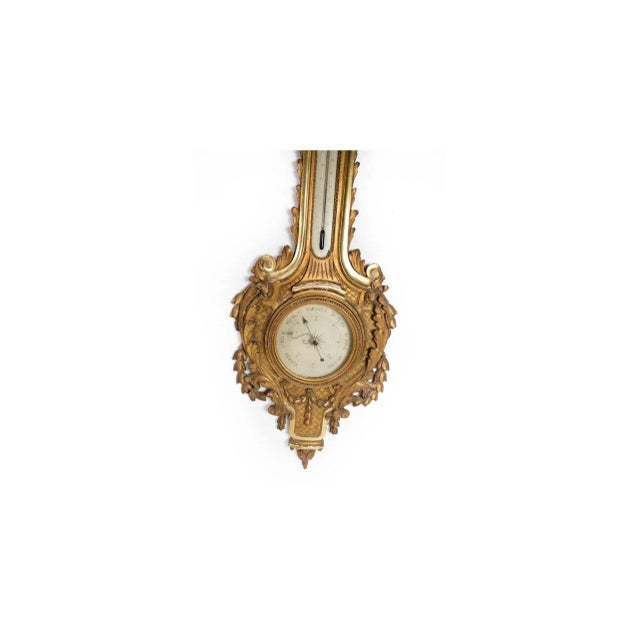 Louis XVI French barometer with carvings and original gilding from the late 1700s. Stands in incredibly beautiful original...
