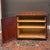 A mid-century Modern Edward Wormley for Drexel 2 door cabinet housing two serving drawers and an additional storage area....