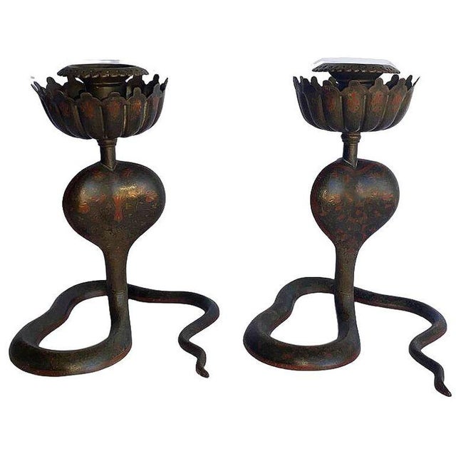 A striking pair of Persian Hand etched cobra candle holders crafted in solid Brass and bronze. Each piece features a...