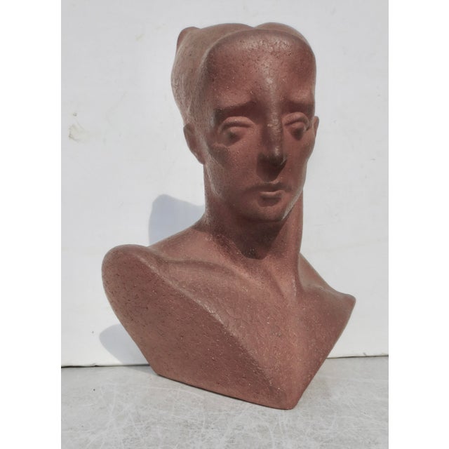 Terrific terra cotta of a male figure, Human with highly refined facial features, high cheekbones, expressive brows,...