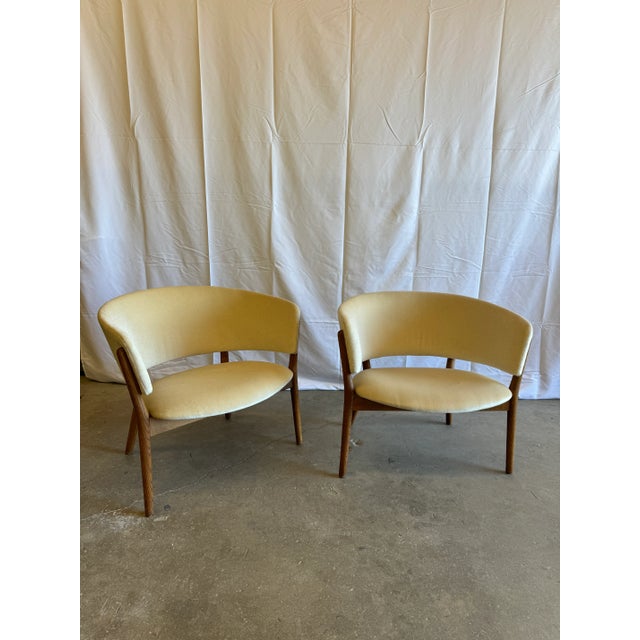 A pair of oak easy lounge chair attributed to Nana Ditzel. Designed by Ditzel in 1952, manufactured by Søren Willadsen,...