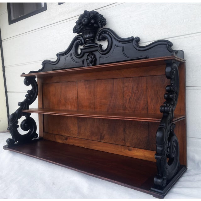 An impressive, original wall shelf or chest of drawers shelf from the second half of the 19th century, designed in the...