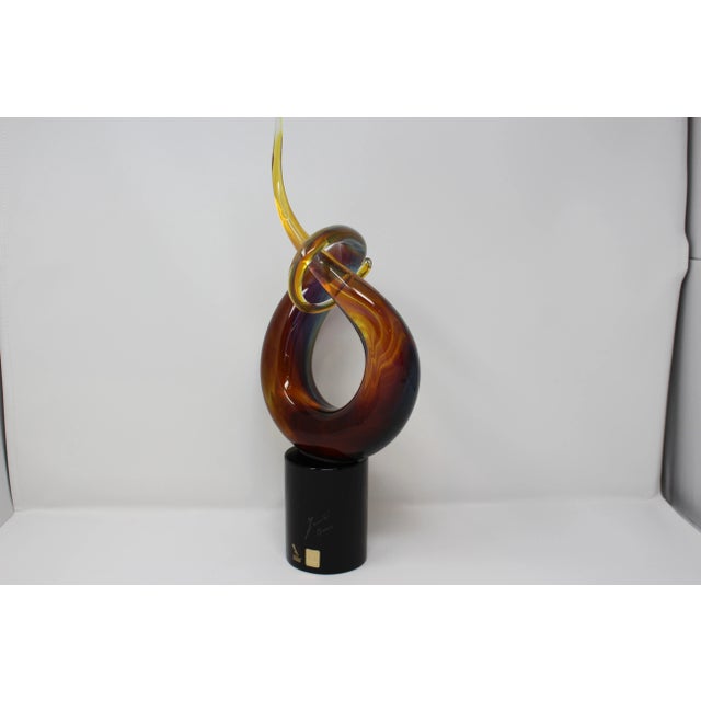 A beautiful Murano Glass sculpture by Famed Glass Master Oscar Zanetti. Made using the calcedonia glass method which...
